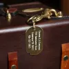 brass id luggage tag with personalization on a no 3 travel trunk