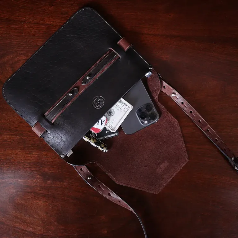 ashley handbag made of two-tone brown buffalo and steerhide leather - open view with phone