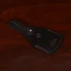 side view Tobacco Brown American Buffalo Luggage Tag on wood table with CL Buffalo