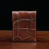 Front pocket wallet with flap in brown American Alligator - front view - 002 - on wood table with a dark background