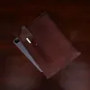 back side of the no. 8 pocket showing the pocket for the stylus pen and an ipad inside for reference