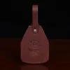 vintage brown luggage id with product stamp
