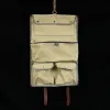 CL - No. 2 Shave Dopp Kit in Vintage Brown American Alligator with No. 8 Khaki Cotton Canvas Lining - Serial Number 002 - open inside view on a wooden table