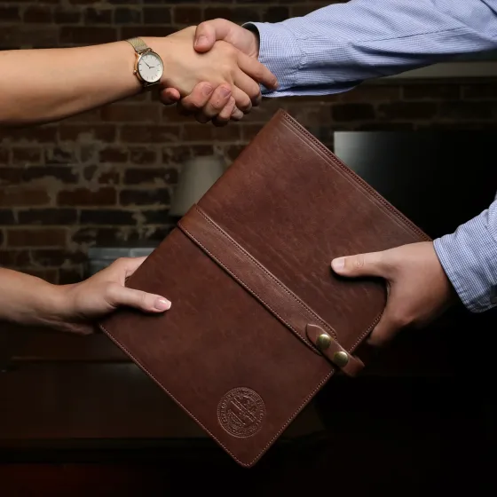 Corporate Gifting with Col. Littleton 2 No. 18 Portfolio with corporate logo being given as a gift to an employee
