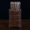 A leather Cigar Case in American Alligator showing the back with brass hardware - id 002