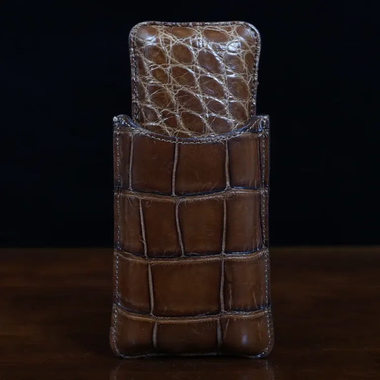 A leather Cigar Case in American Alligator showing the back with brass hardware - id 002