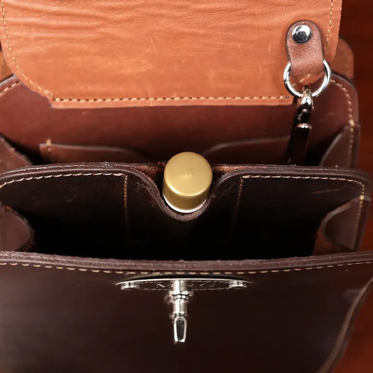 Gadabout crossbody bag - showing the inside with chapstick