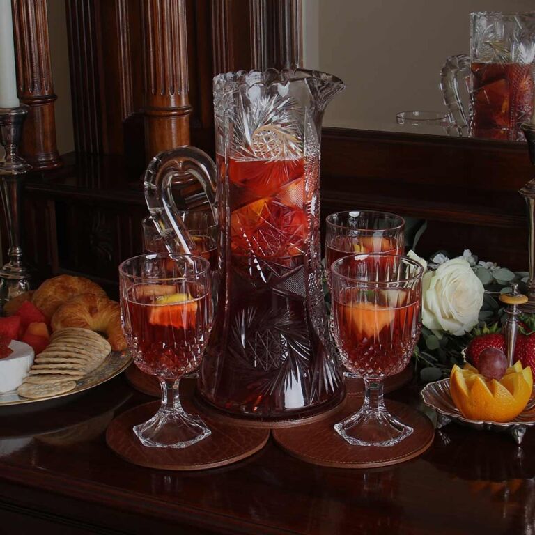 leather centerpiece with glasses and pitcher