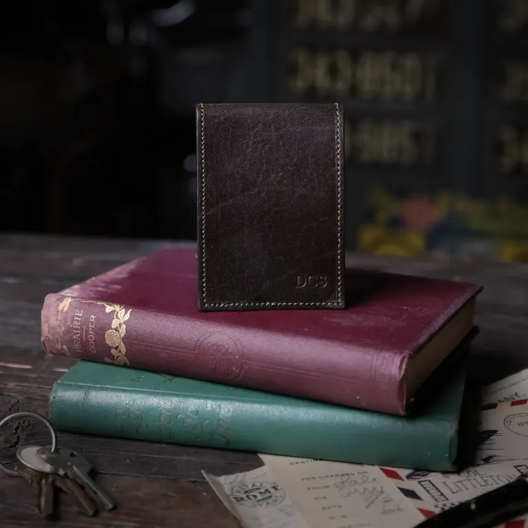 no 102 wallet in tobacco buffalo on books - front view