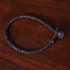 braided brown leather bracelet with and loop closure - top view