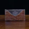 No. 3 Card Wallet in Vintage Brown American Alligator - ID 003 - front view with business card cut out on No. 2 Card Wallet in Vintage Brown American Alligator - ID 001 - front view on a black background