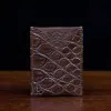 No. 4 Card Case in Vintage Brown American Alligator - ID 002 - front view on a wood table and dark background