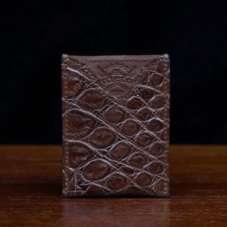No. 4 Card Case in Vintage Brown American Alligator - ID 002 - front view on a wood table and dark background