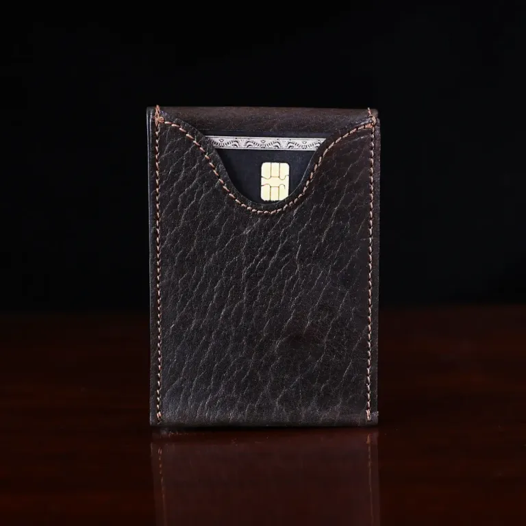 no 102 billfold in tobacco buffalo on dark background - back view