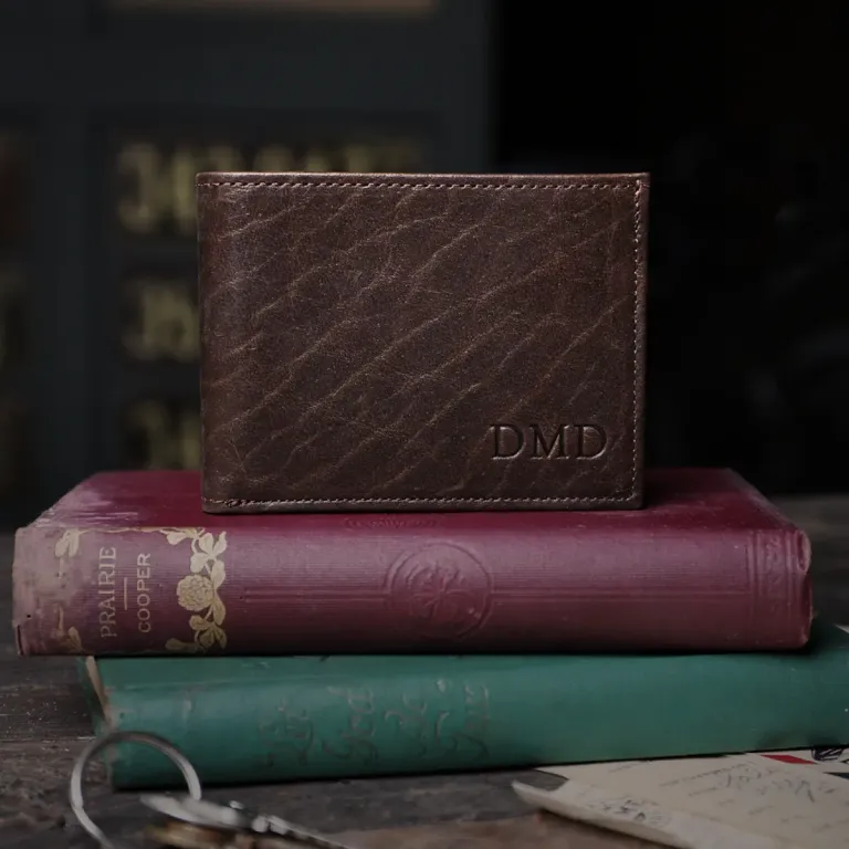 no4 tobacco buffalo leather billfold wallet- front view- on books