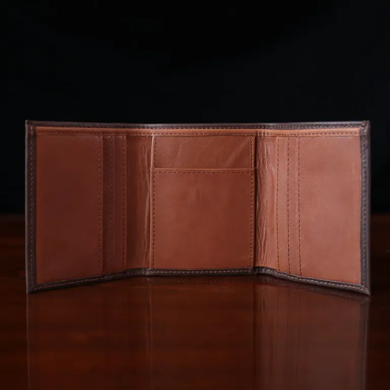 no 1 tri fold wallet in tobacco buffalo on dark background - open view