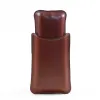 The front side of a Authentic Branded American Steerhide and American Alligator trim leather cigar case with brass hardware.