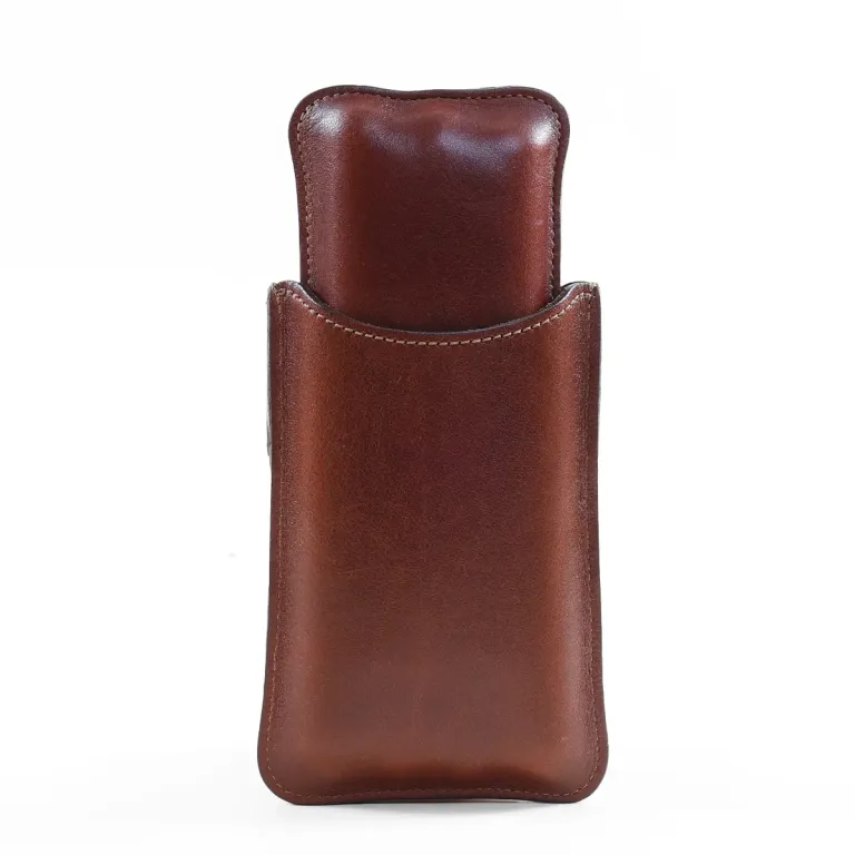 The front side of a Authentic Branded American Steerhide and American Alligator trim leather cigar case with brass hardware.