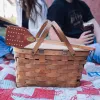 Italian Bridle Leather and American oak flyswatter propped on a picnic basket
